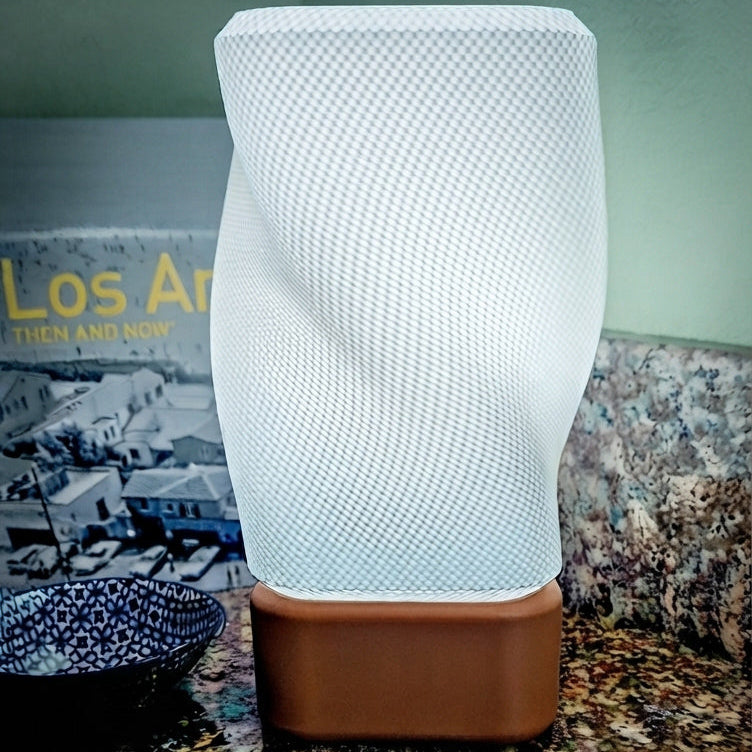 Orange mesh lamp with warm ambient light