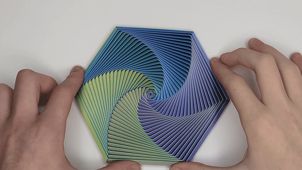 Demonstração do brinquedo espiral hexagonal impresso em 3D