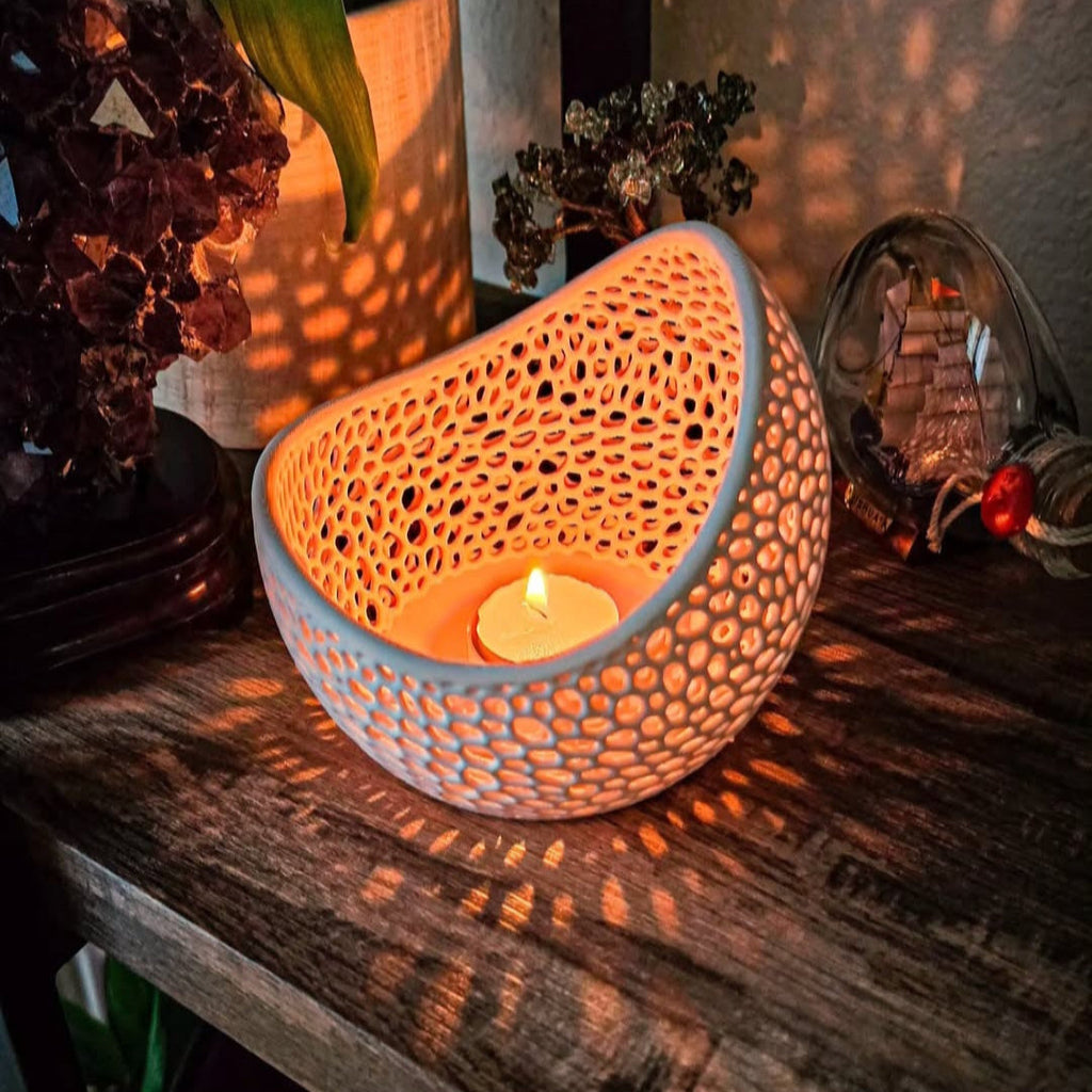 Perforated 3D printed lamp with a flameless LED light